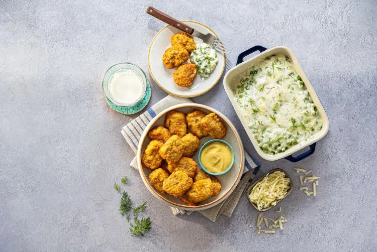 Crispy Chicken Nuggets with Creamy Dill Peas