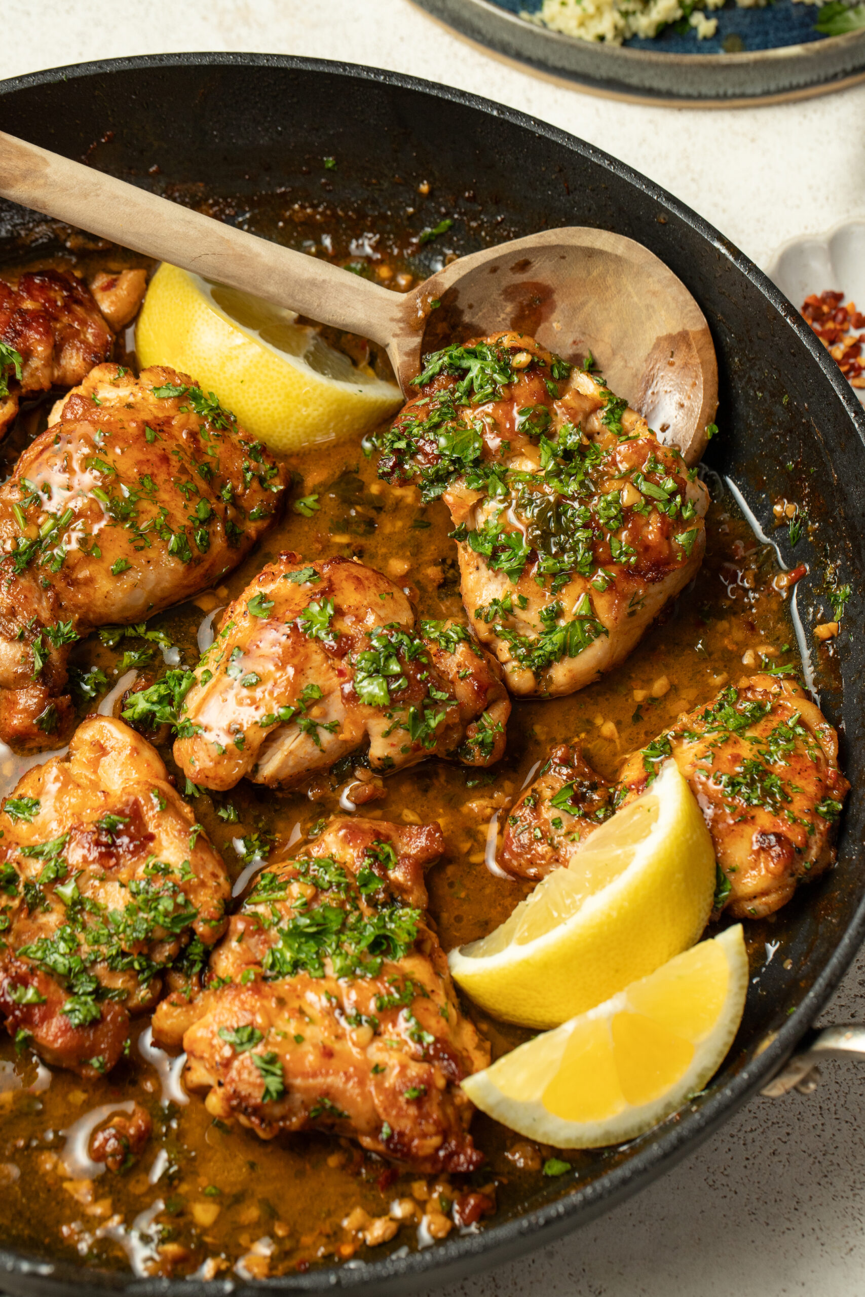 Lemon Butter Chicken Thighs with Herb and Olive Couscous - Alberta Milk